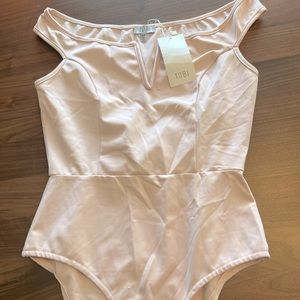 Light pink off the shoulder Tobi bodysuit, size small